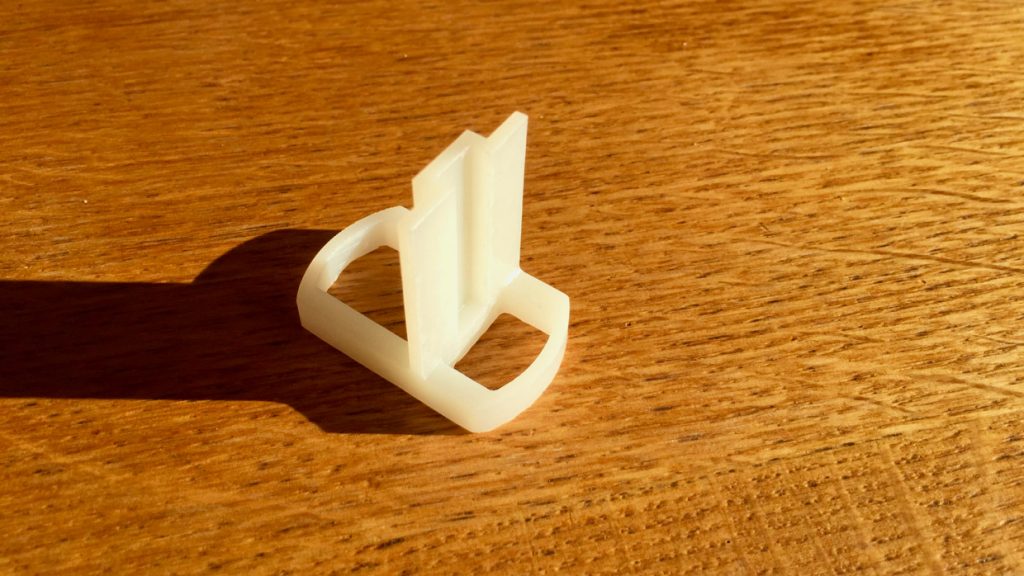 Attache pour porte coulissante